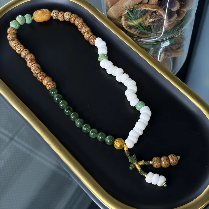 Jasper-Moon , Garlic Bead And Bone Double-Loop Bracelet Paired With Lacquer Cam
Jasper-Moon , Garlic Bead And Bone Double-Loop Bracelet Paired With Lacquer Cam