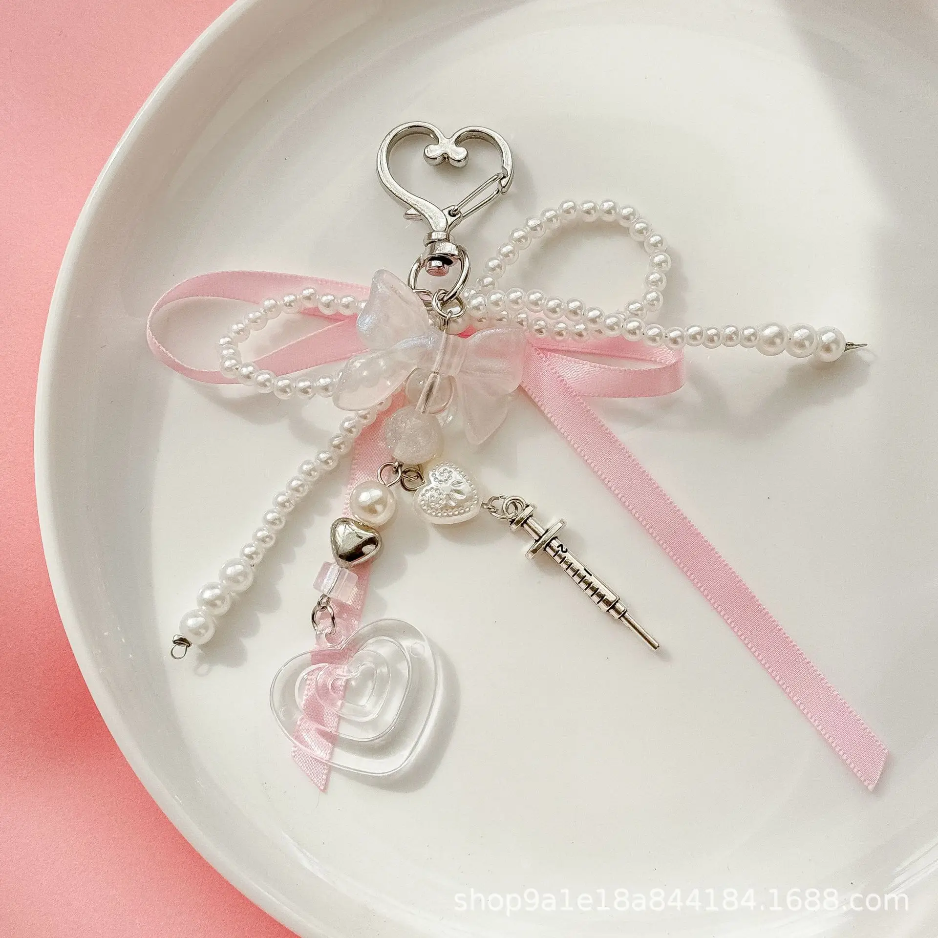 Korean pendant cute girl bow love pendant keychain versatile bag pendant exquisite small gift
Korean pendant cute girl bow love pendant keychain versatile bag pendant exquisite small gift