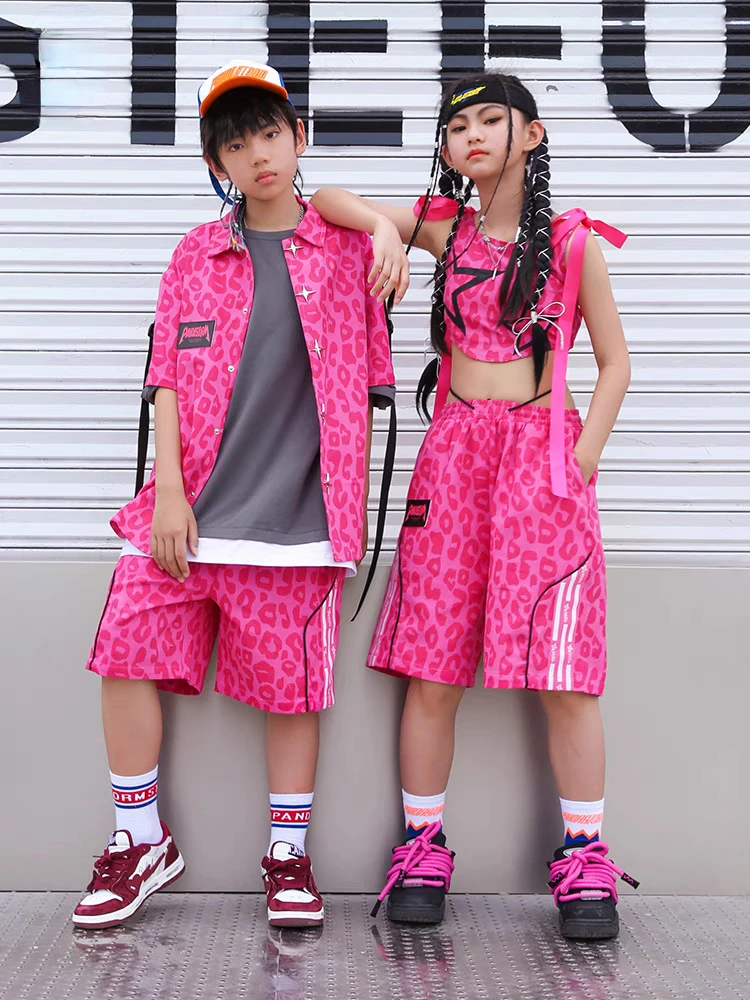 Детская одежда для уличных танцев в стиле хип-хоп, рубашка с розовым принтом для мальчиков, шорты для девочек, костюм для джаза, современного танца, повседневная одежда для подростков
Детская одежда для уличных танцев в стиле хип-хоп, рубашка с розовым принтом для мальчиков, шорты для девочек, костюм для джаза, современного танца, повседневная одежда для подростков