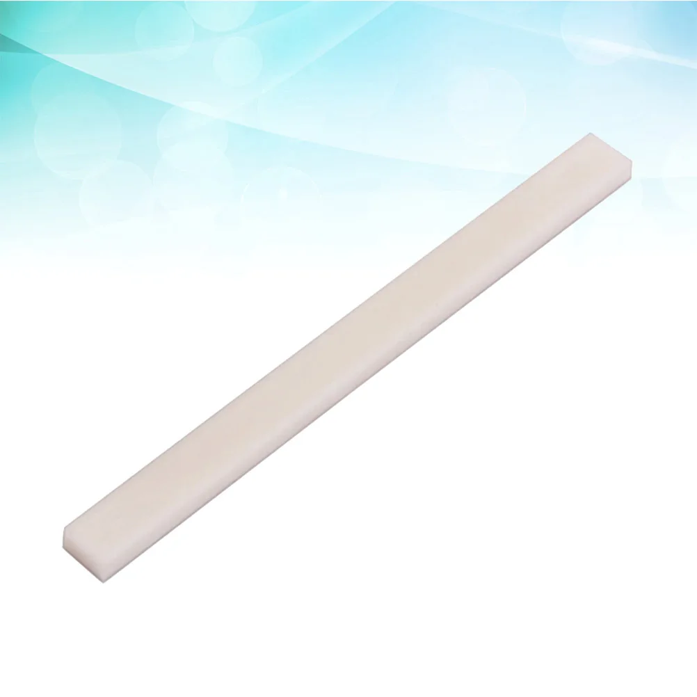 Natural Bone Bridge Saddle Replacement for Acoustic Guitar Flat Buffalo Bone Saddle High Quality Guitar Parts Tone Enhancement
Natural Bone Bridge Saddle Replacement for Acoustic Guitar Flat Buffalo Bone Saddle High Quality Guitar Parts Tone Enhancement
