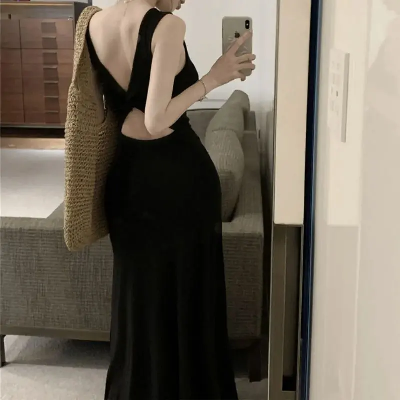 Fashionable Backless Black Slim Long Slip Dress Summer Solid Color Female Clothing Aura Hollow Out Waist Elegant Bag Hip Dresses
Fashionable Backless Black Slim Long Slip Dress Summer Solid Color Female Clothing Aura Hollow Out Waist Elegant Bag Hip Dresses