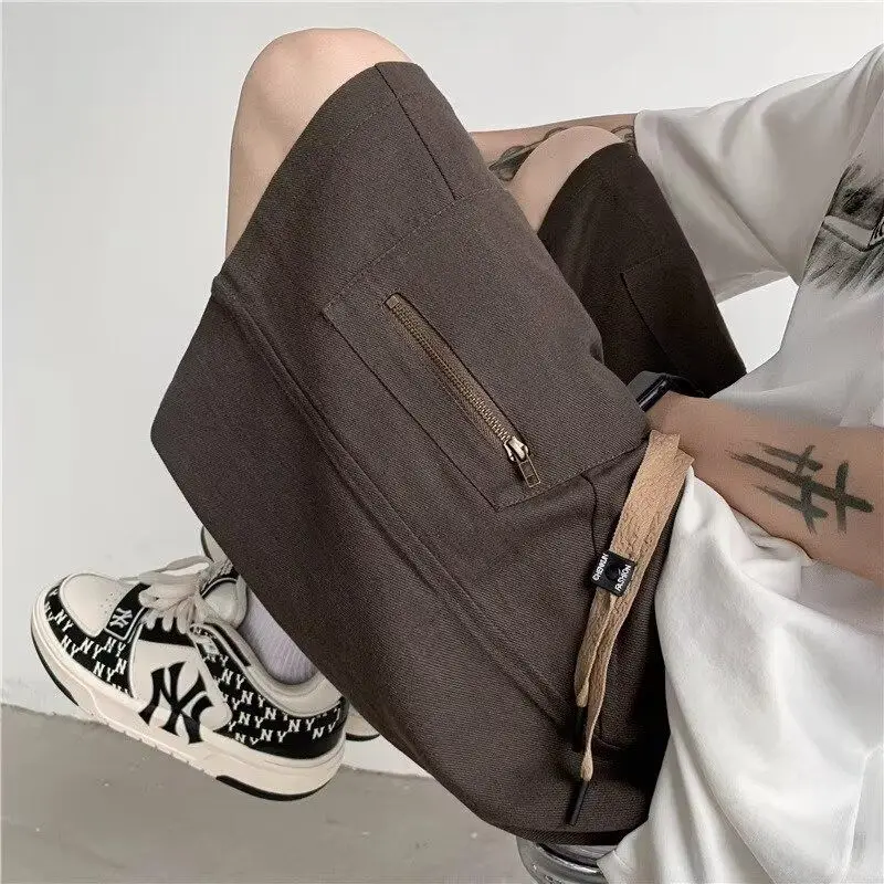 Брюки-карго цвета хаки для мужчин, летние, в американском стиле, свободные, широкие, повседневные, средней длины, для подростков
Брюки-карго цвета хаки для мужчин, летние, в американском стиле, свободные, широкие, повседневные, средней длины, для подростков