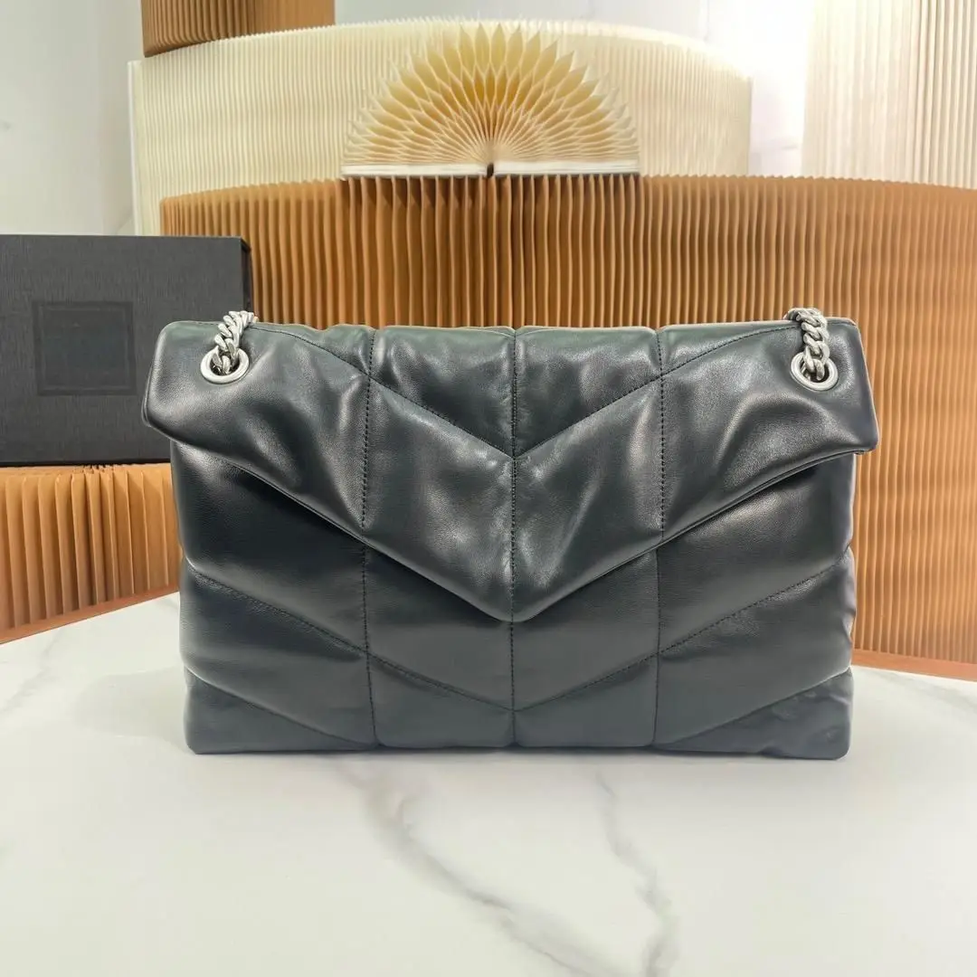 Black Chevron-Quilted Leather Flap Bag with Silver Chain Strap, Shoulder & Crossbody Purse, Luxury Designer Inspired Women's Handbag Design Bag.
Black Chevron-Quilted Leather Flap Bag with Silver Chain Strap, Shoulder & Crossbody Purse, Luxury Designer Inspired Women's Handbag Design Bag.