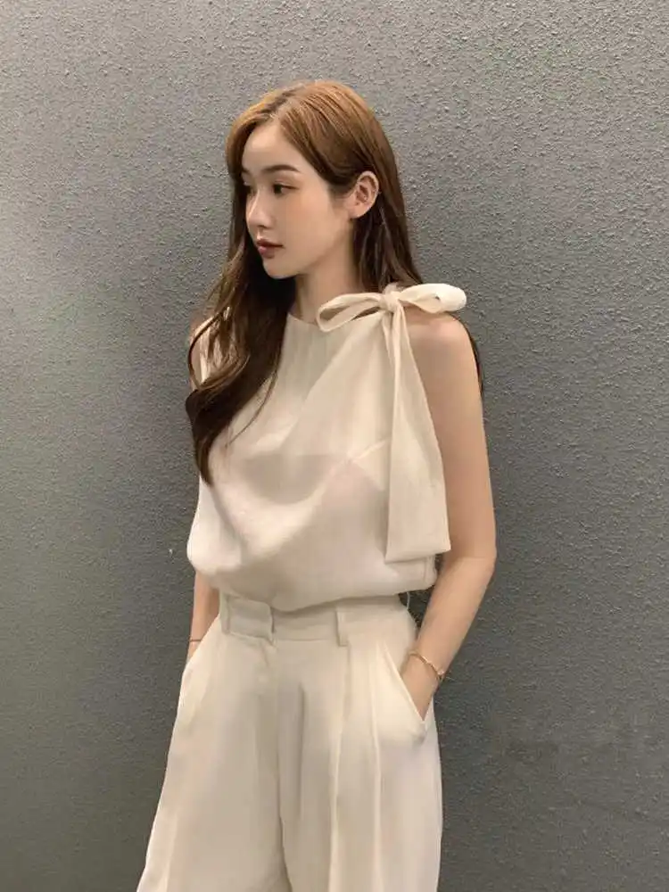 Clothland Women Elegant Bow Tie Blouse Sleeveless Shirt White Black Basic Summer Casual Tops Blusa Mujer WA306
Clothland Women Elegant Bow Tie Blouse Sleeveless Shirt White Black Basic Summer Casual Tops Blusa Mujer WA306