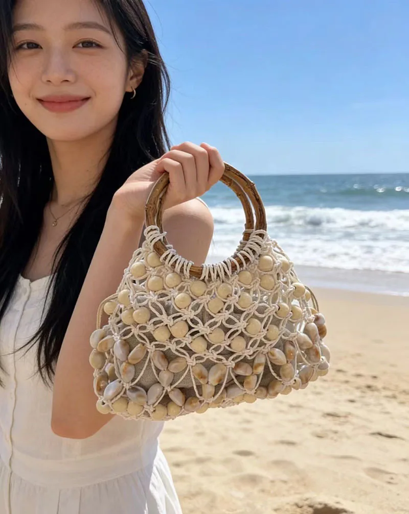 Handmade Beading Women Bag Bamboo Handle Handbags and Purses Hollow Travel Woven Straw Bags for Women Rope Crochet Beach Bag
Handmade Beading Women Bag Bamboo Handle Handbags and Purses Hollow Travel Woven Straw Bags for Women Rope Crochet Beach Bag