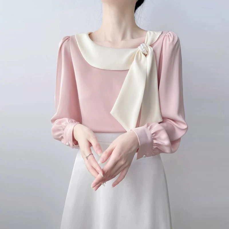 Contrasting bow streamer pink shirt women's long sleeve satin drape is not easy to wrinkle high-end sense top new style
Contrasting bow streamer pink shirt women's long sleeve satin drape is not easy to wrinkle high-end sense top new style
