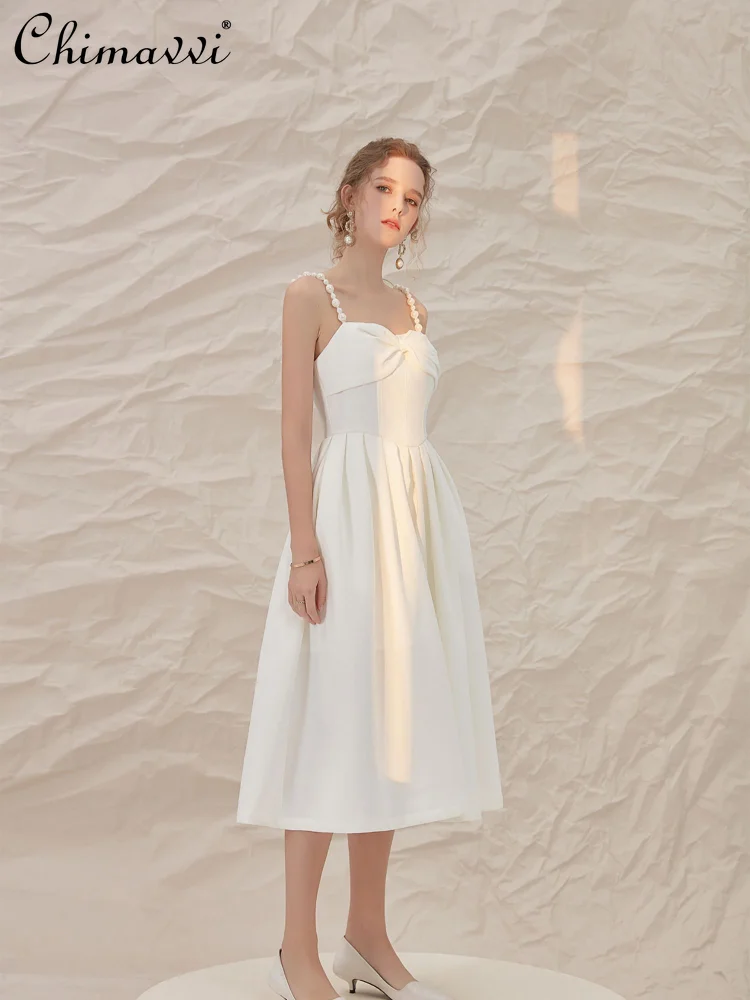 French Style Retro Elegant Bow Pearl Straps Sleeveless Backless High Waist Pleated A-line White Evening Long Dress Women Summer
French Style Retro Elegant Bow Pearl Straps Sleeveless Backless High Waist Pleated A-line White Evening Long Dress Women Summer