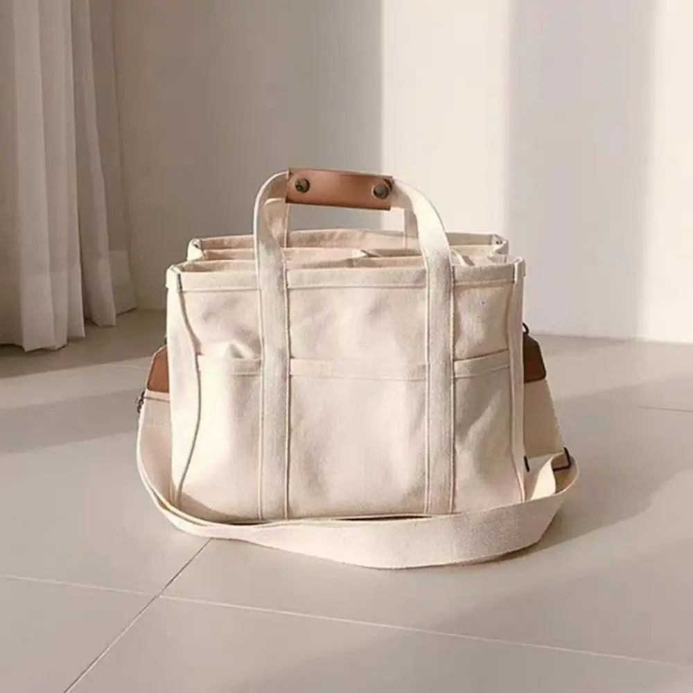 Solid Color Tote Bag Casual Large Capacity Canvas Shoulder Bag Adjustable Multi-pocket Clutch Bag Woman
Solid Color Tote Bag Casual Large Capacity Canvas Shoulder Bag Adjustable Multi-pocket Clutch Bag Woman