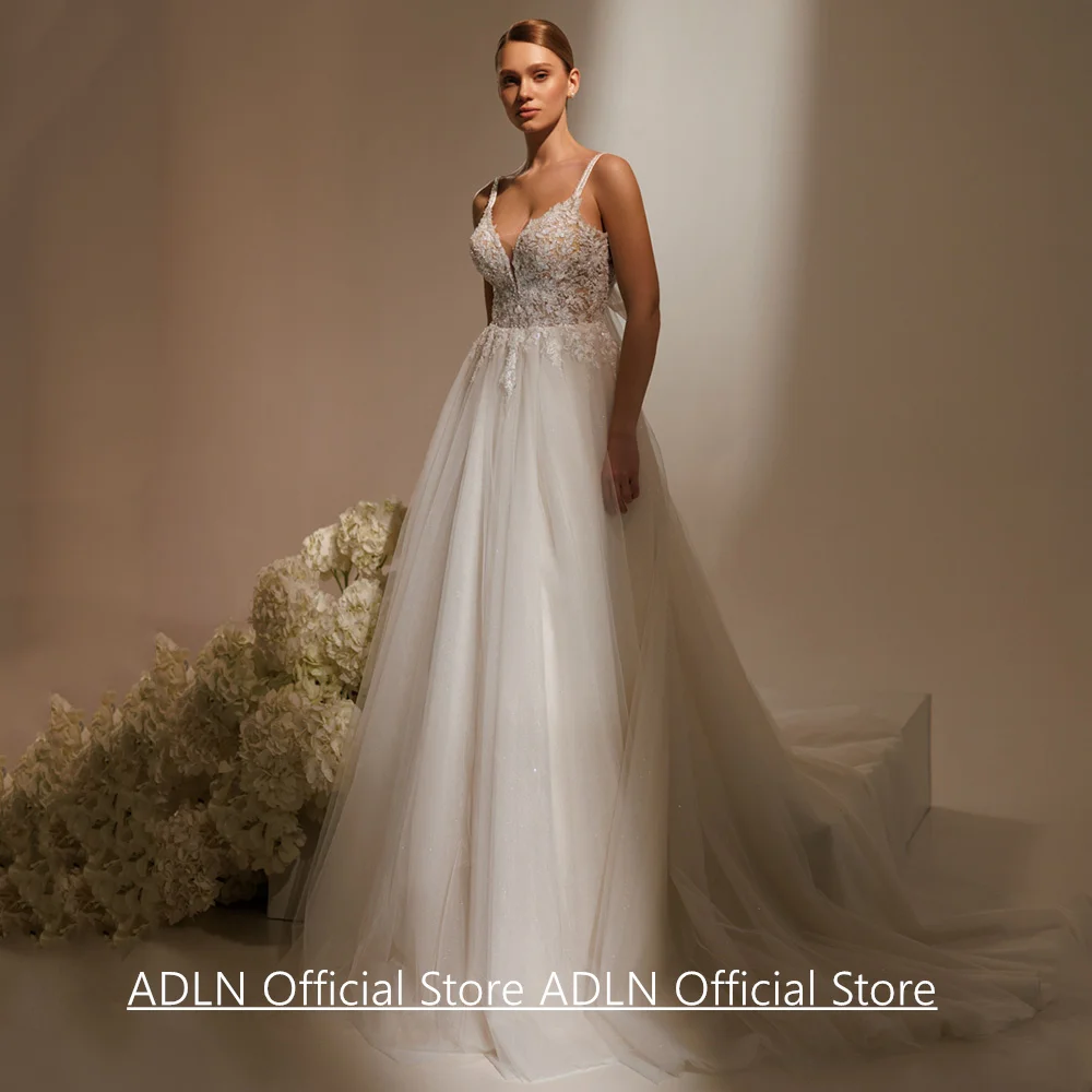 Sexy Soft Tulle Wedding Dress Customized Spaghetti Straps V Neck Beading Applique A Line Backless Bridal Gown Robe De Mariee
Sexy Soft Tulle Wedding Dress Customized Spaghetti Straps V Neck Beading Applique A Line Backless Bridal Gown Robe De Mariee