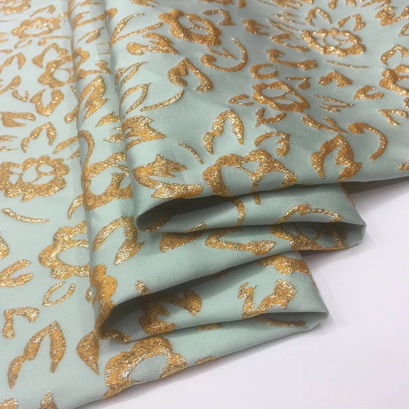 Luxurious gilded jacquard brocade fabric for dress trench coat and suit fashion
Luxurious gilded jacquard brocade fabric for dress trench coat and suit fashion