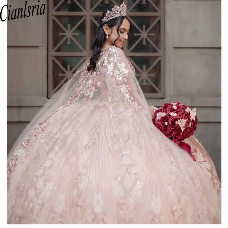 Rose Gold Shiny Quinceanera Dresses Ball Gown Lace Applique Beaded Tiered With Cape Corset Sweet 16 Dress Vestido De 15 Anos
Rose Gold Shiny Quinceanera Dresses Ball Gown Lace Applique Beaded Tiered With Cape Corset Sweet 16 Dress Vestido De 15 Anos