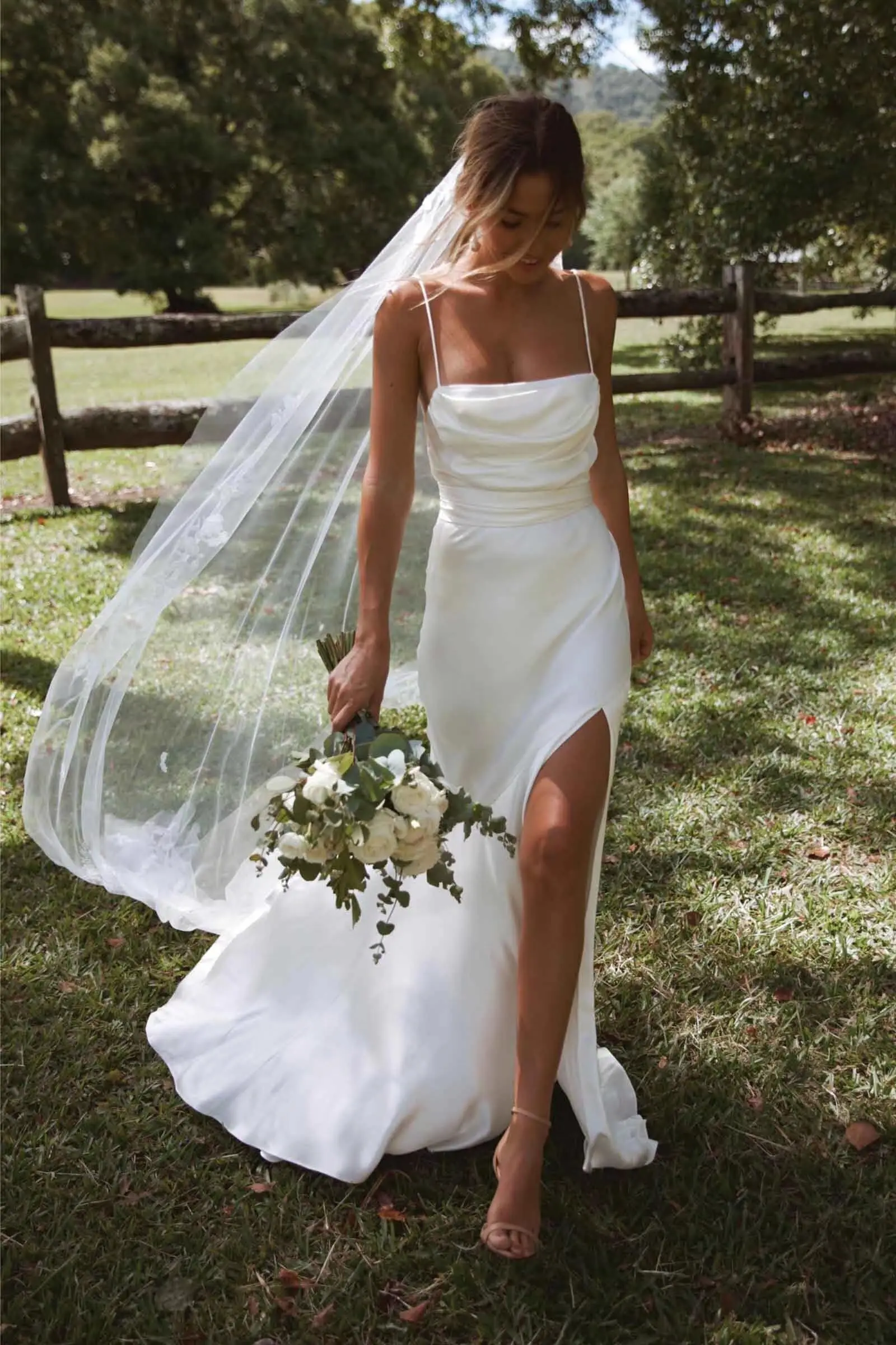 Customized New Arrival Satin Wedding Dress For Woman Bride Spaghetti Straps Cowl Neck High Slit Bridal Gown
Customized New Arrival Satin Wedding Dress For Woman Bride Spaghetti Straps Cowl Neck High Slit Bridal Gown