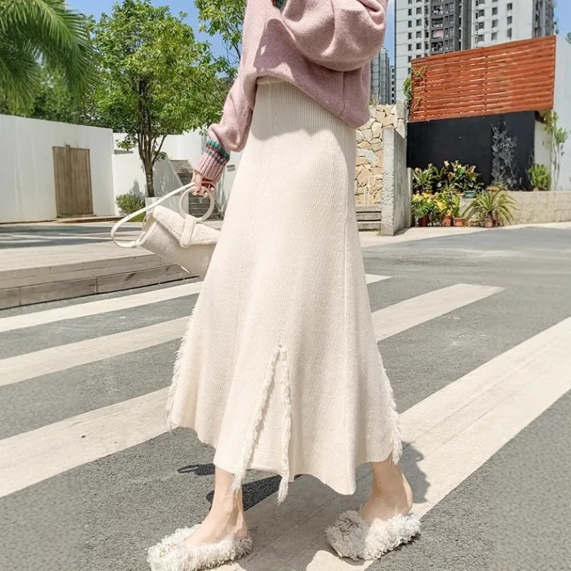 Autumn Winter Streetwear Tassel Knitted High Waist Sweater Skirt A-Line Elegant Office Lady Long Skirt Women Pleated Irregular
Autumn Winter Streetwear Tassel Knitted High Waist Sweater Skirt A-Line Elegant Office Lady Long Skirt Women Pleated Irregular