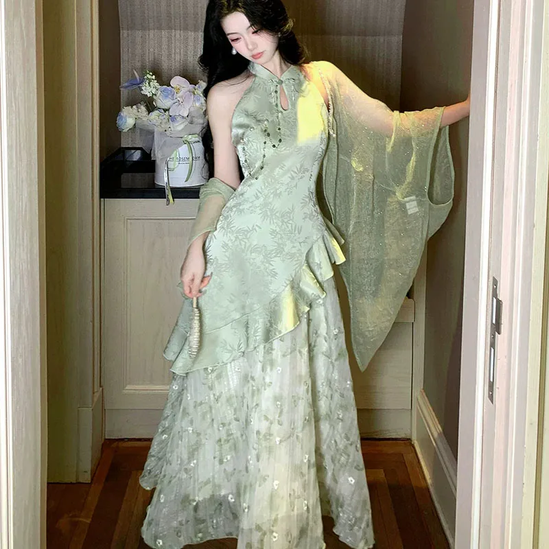 Women's Green Cheongsam Halter Maxi Dress 2026New Bamboo Jacquard Ruffle Luxury Y2K Asymmetrical Hem Chiffon Overlay Party Dress
Women's Green Cheongsam Halter Maxi Dress 2026New Bamboo Jacquard Ruffle Luxury Y2K Asymmetrical Hem Chiffon Overlay Party Dress