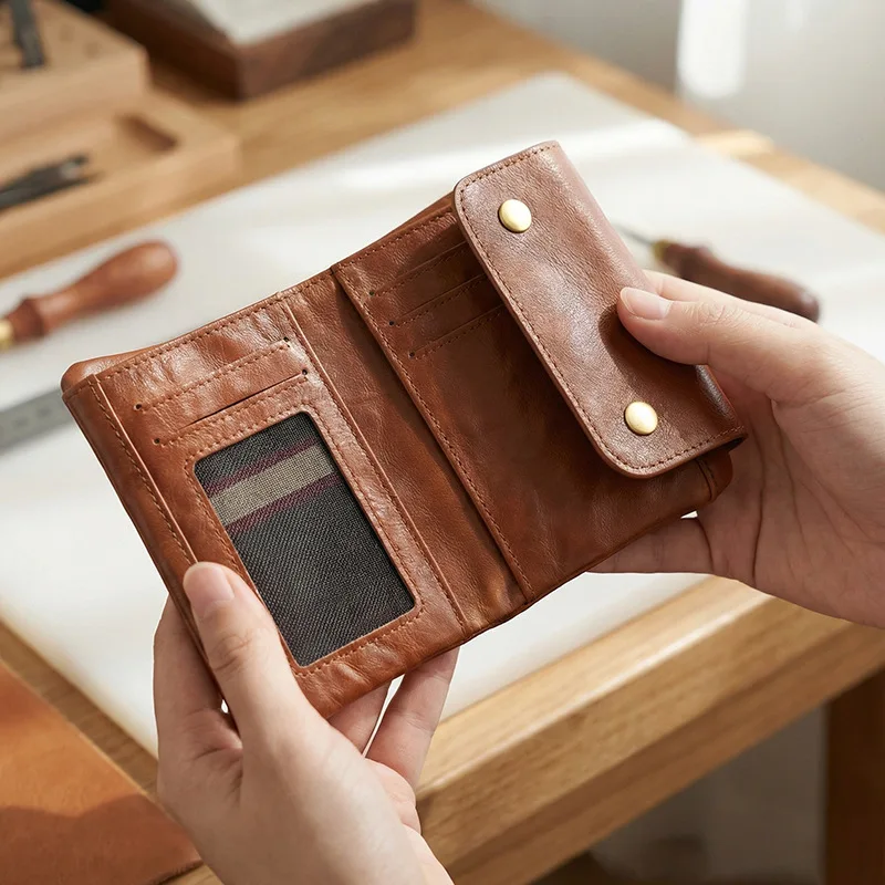 Multi-functional genuine leather small money storage with multiple card slots and portable short-handled ladies' handbag
Multi-functional genuine leather small money storage with multiple card slots and portable short-handled ladies' handbag