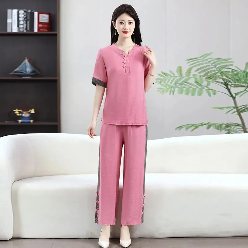 Women Casual 2 Piece Set Short Sleeve T Shirt Wide Leg Pants Loose Summer Outfit
Women Casual 2 Piece Set Short Sleeve T Shirt Wide Leg Pants Loose Summer Outfit