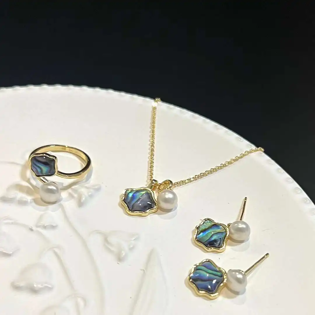 Natural Abalone Shell Set 6-7mm Natural High Quality Freshwater Pearl Necklace Ring Earring Set
Natural Abalone Shell Set 6-7mm Natural High Quality Freshwater Pearl Necklace Ring Earring Set
