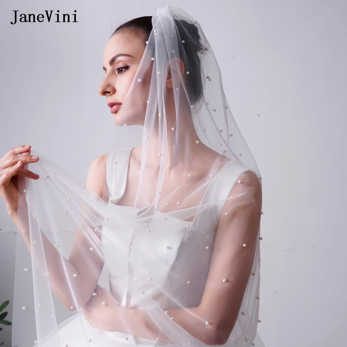 JaneVini Роскошная жемчужная длинная фата цвета слоновой кости с расческой, один слой, мягкий тюль, 3 м, соборная фата невесты, свадебные аксессуары для волос
JaneVini Роскошная жемчужная длинная фата цвета слоновой кости с расческой, один слой, мягкий тюль, 3 м, соборная фата невесты, свадебные аксессуары для волос