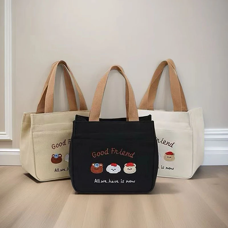 Cute Embroidered Small Bear Printed Canvas Versatile Handbag Office Worker Lunch Bento Tote Bag
Cute Embroidered Small Bear Printed Canvas Versatile Handbag Office Worker Lunch Bento Tote Bag
