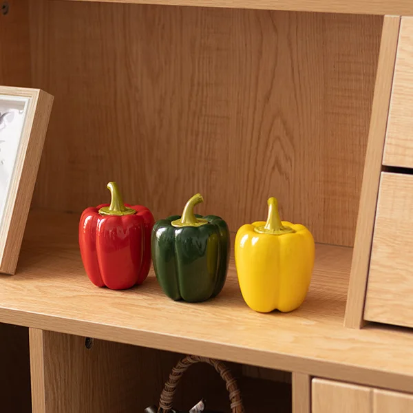 Chinese red yellow green pepper ceramic tea pot small tea pot personality creative household decoration sealed storage tank
Chinese red yellow green pepper ceramic tea pot small tea pot personality creative household decoration sealed storage tank