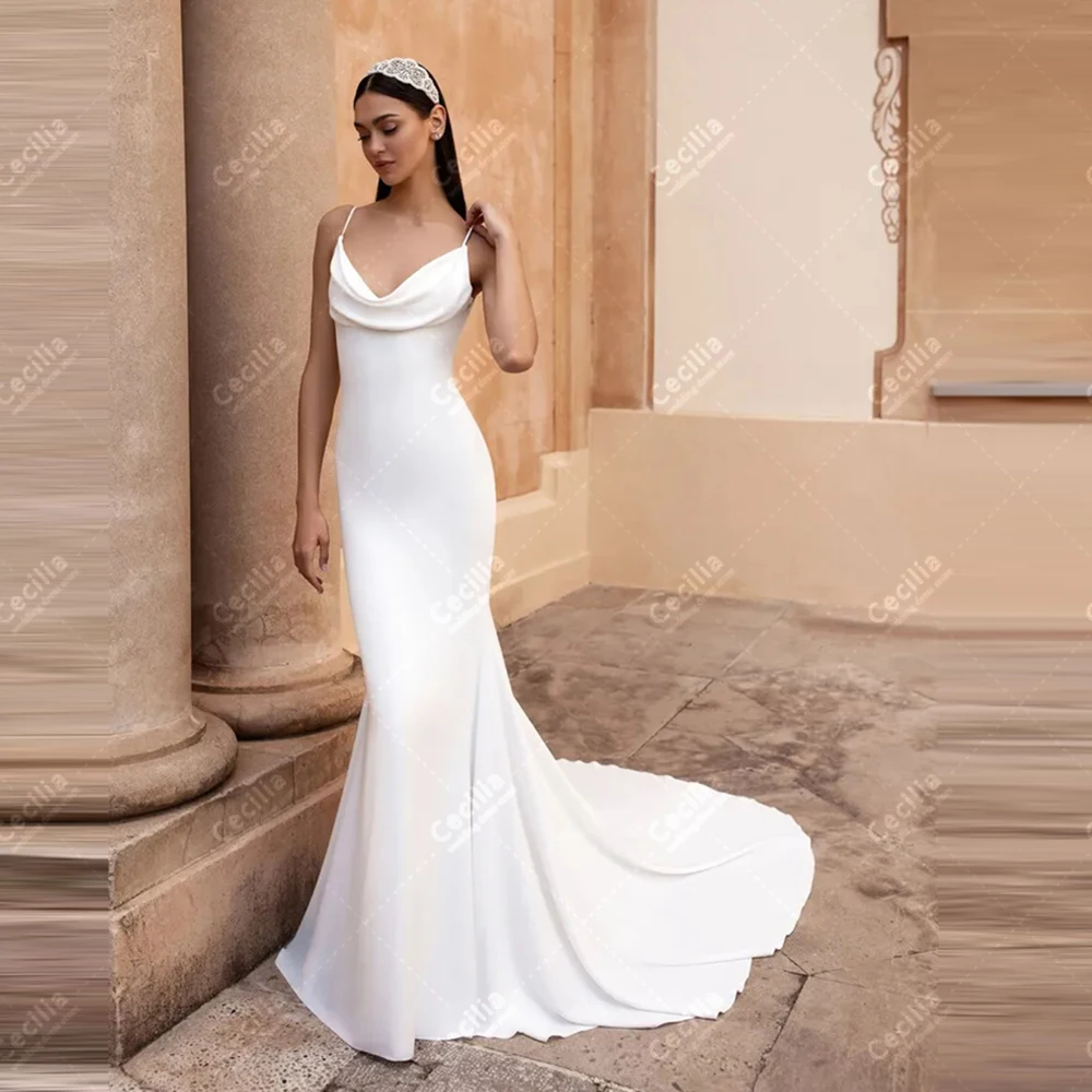 Простые свадебные платья Атласные свадебные платья на тонких бретельках Халаты для официальной вечеринки на тонких бретельках по индивидуальному заказу Vestidos De Novia
Простые свадебные платья Атласные свадебные платья на тонких бретельках Халаты для официальной вечеринки на тонких бретельках по индивидуальному заказу Vestidos De Novia