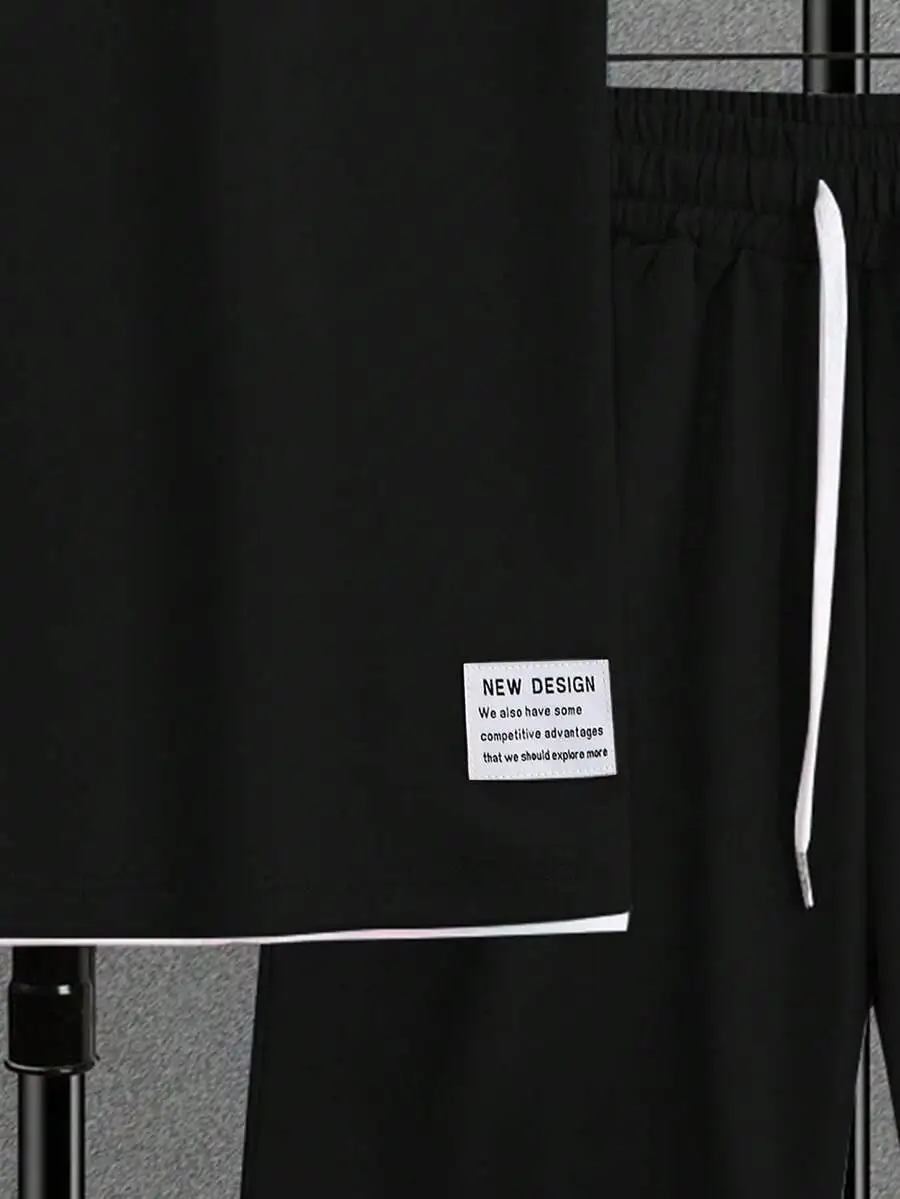 Black Mens Casual Two-Piece Set: Round Neck Short Sleeve Tee With Drawstring Waist Shorts
Black Mens Casual Two-Piece Set: Round Neck Short Sleeve Tee With Drawstring Waist Shorts