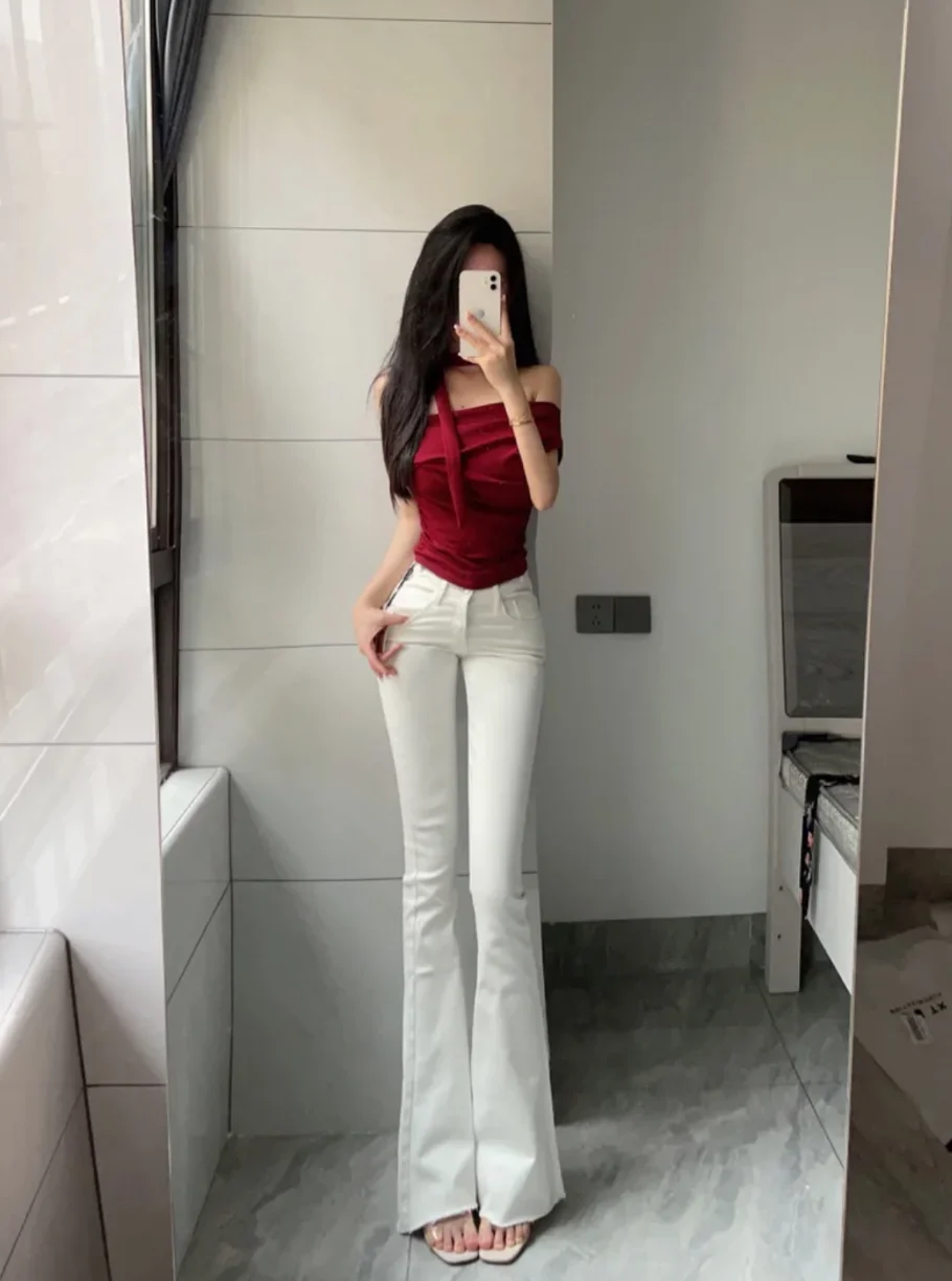 High Waist White Single Button Jeans Women's Slimming Elastic Micro Flared Frayed Long Pants Cotton Stretch Denim
High Waist White Single Button Jeans Women's Slimming Elastic Micro Flared Frayed Long Pants Cotton Stretch Denim