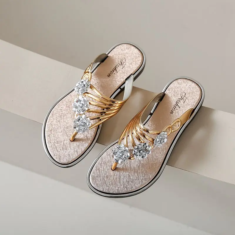 New women's word slippers fashionable flat bottom rhinestone flower casual slippers
New women's word slippers fashionable flat bottom rhinestone flower casual slippers