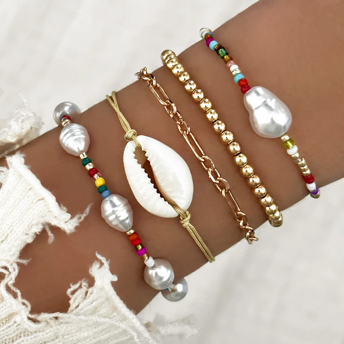 Hot Sale New Bohemian Beaded Bracelet, Imitation Pearl Natural Shell Beaded Bracelet 5-piece Set
Hot Sale New Bohemian Beaded Bracelet, Imitation Pearl Natural Shell Beaded Bracelet 5-piece Set