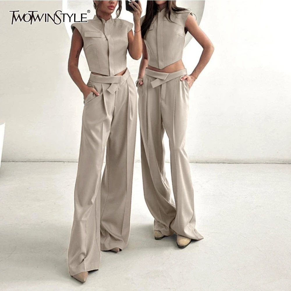 TWOTWINSTYLE Solid Two Piece Set for Women Stand Collar Sleeveless Vest High Waist Spliced Folds Wide Leg Pants Suit Female New
TWOTWINSTYLE Solid Two Piece Set for Women Stand Collar Sleeveless Vest High Waist Spliced Folds Wide Leg Pants Suit Female New