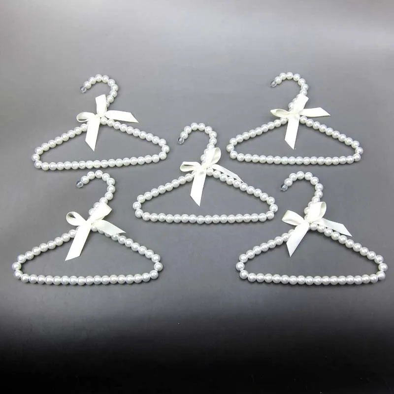 Baby Coat Hangers Rack For Clothes Kids Pet Pearl Plastic Hanger Child Clothes Rack Pet Dog Clothes Pearl Hanger Wardrobe Baby
Baby Coat Hangers Rack For Clothes Kids Pet Pearl Plastic Hanger Child Clothes Rack Pet Dog Clothes Pearl Hanger Wardrobe Baby