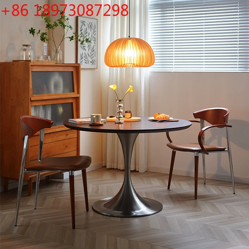 Nordic retro solid wood round dining table for home use modern simple stainless steel round table
Nordic retro solid wood round dining table for home use modern simple stainless steel round table
