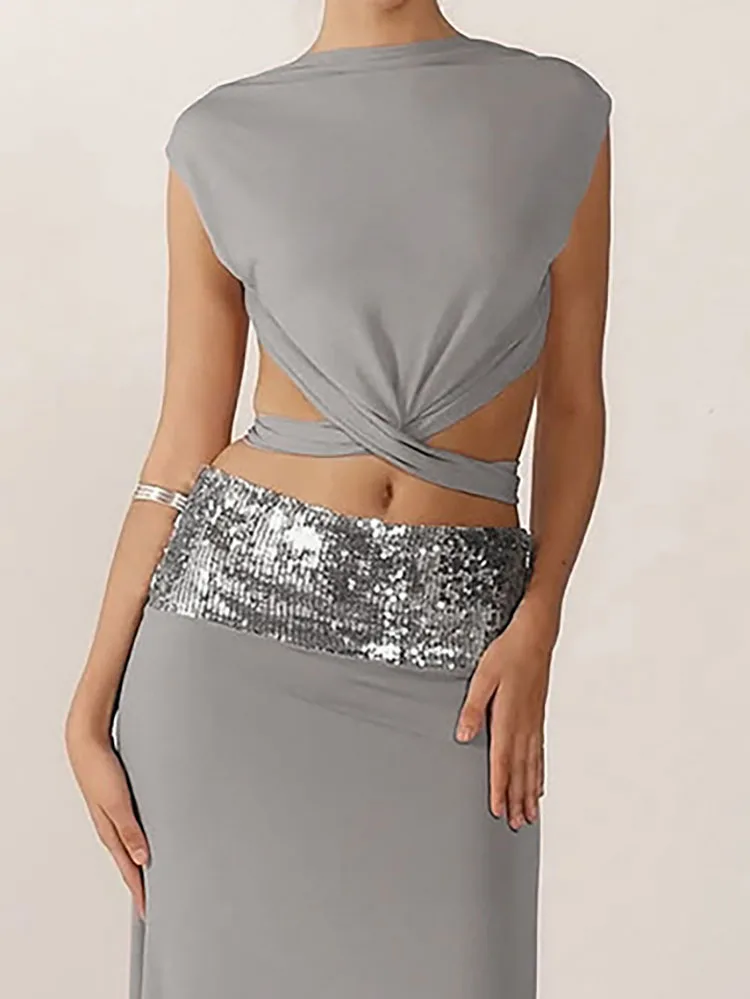 Сексуальные облегающие наряды с открытой спиной, элегантные топы с круглым вырезом и длинной юбкой, женский повседневный костюм без рукавов с блестящими сращиваниями, комплект из 2 предметов
Сексуальные облегающие наряды с открытой спиной, элегантные топы с круглым вырезом и длинной юбкой, женский повседневный костюм без рукавов с блестящими сращиваниями, комплект из 2 предметов