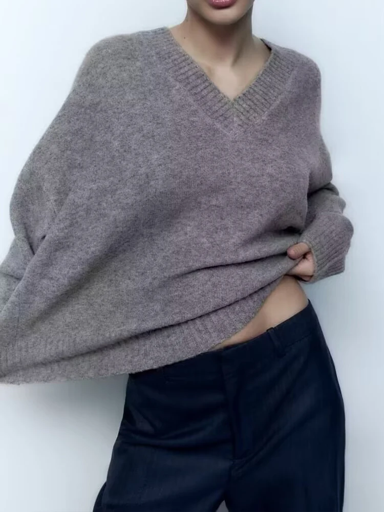 New autumn and winter women's clothing lazy western-style casual versatile V-neck sweater soft knitted sweater top
New autumn and winter women's clothing lazy western-style casual versatile V-neck sweater soft knitted sweater top