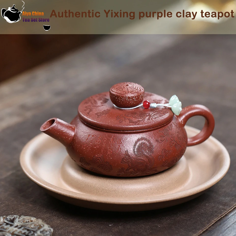 Yixing purple clay teapot, original ore, red sloping mud, carved squirrel shaped spout, Han tile, Kung Fu tea set Chinese teapot
Yixing purple clay teapot, original ore, red sloping mud, carved squirrel shaped spout, Han tile, Kung Fu tea set Chinese teapot