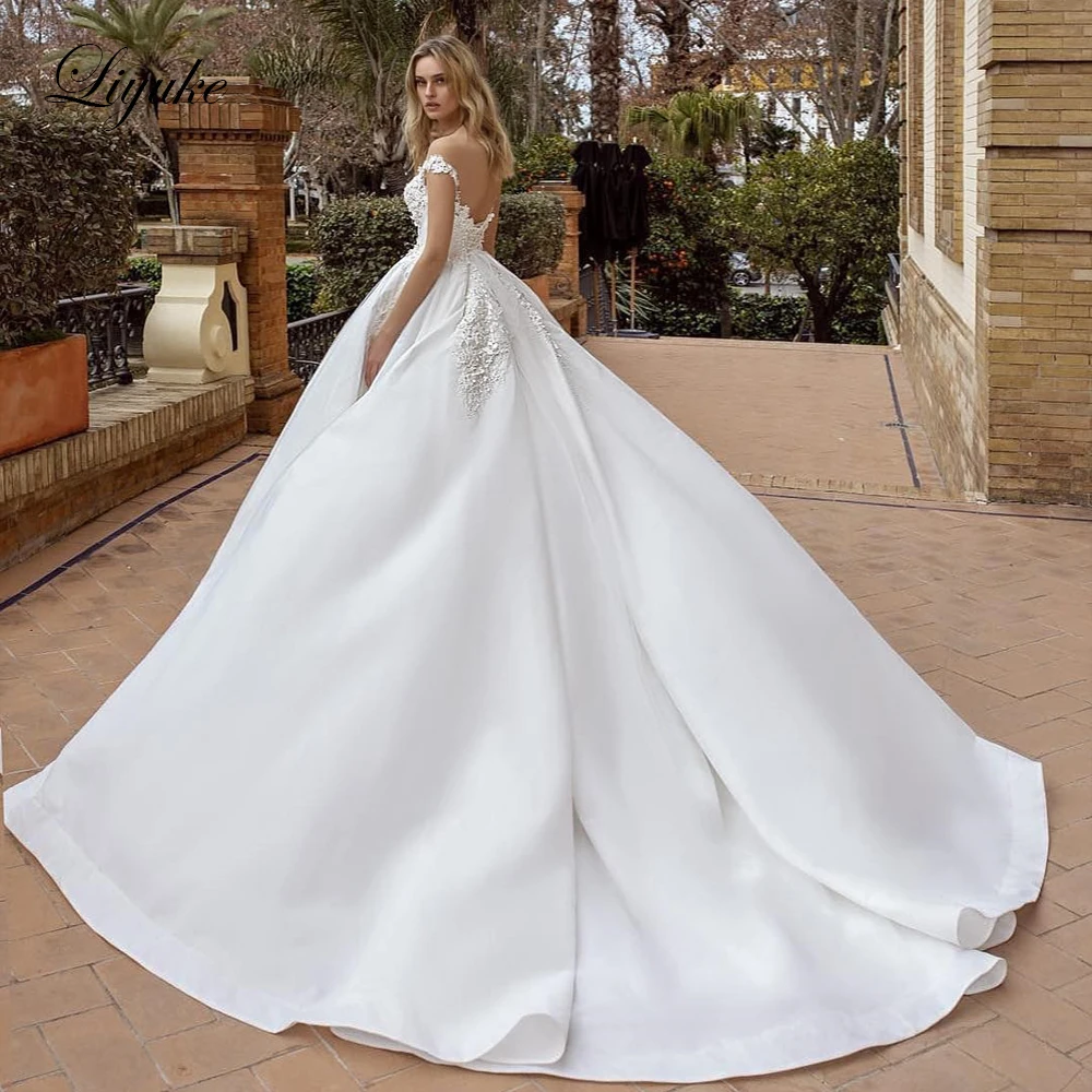 Liyuke Luxury Beading 3D Appliques Ball Gown Wedding Dress Illusion Neck And Back Bridal Gowns Vestido De Noiva
Liyuke Luxury Beading 3D Appliques Ball Gown Wedding Dress Illusion Neck And Back Bridal Gowns Vestido De Noiva