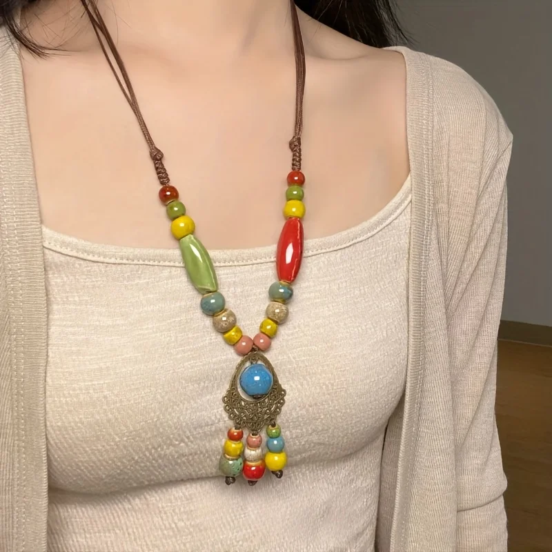 Bohemian ceramic necklace hand-woven beaded ethnic style ceramic fringe pendant Long necklace gift for female friends
Bohemian ceramic necklace hand-woven beaded ethnic style ceramic fringe pendant Long necklace gift for female friends