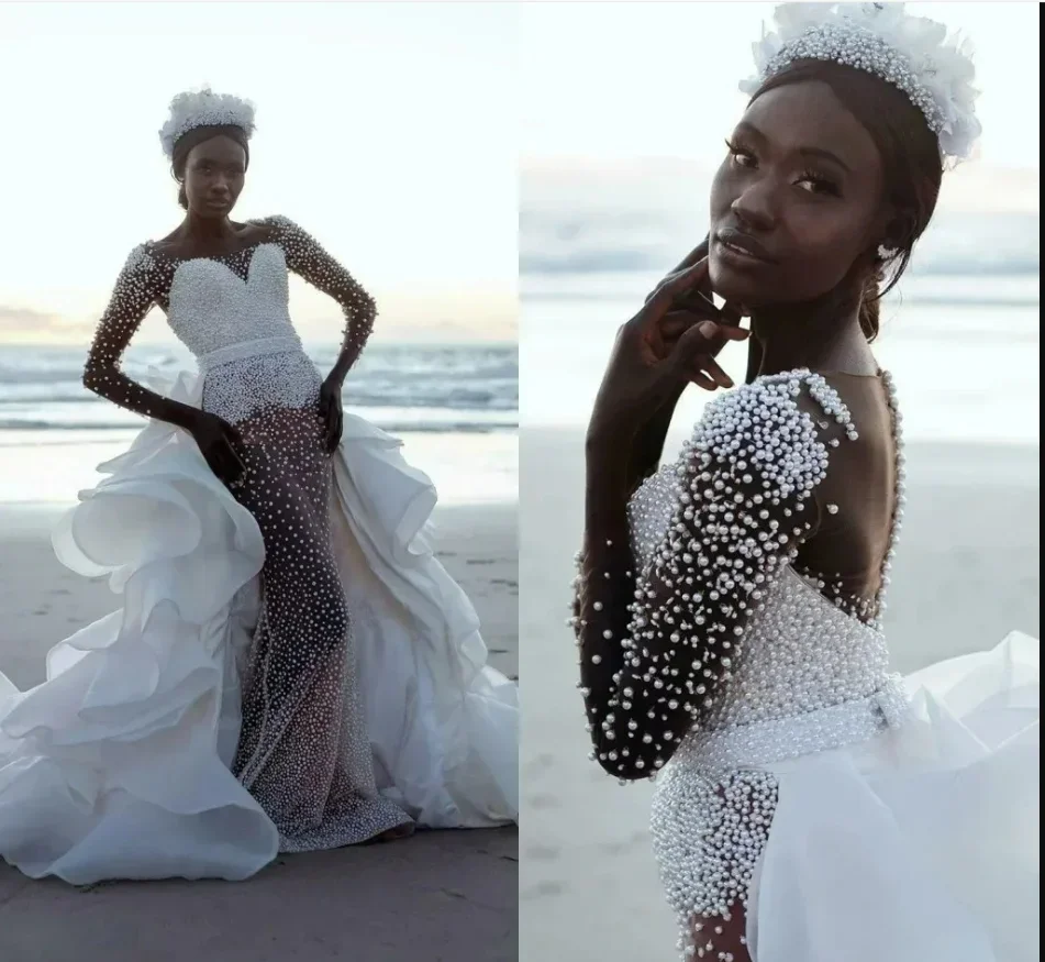 Customized African Beach Handwork Heavy Pearls Wedding Dress with Removable Skirt Vestidos De Novia Long Sleeves Bridal Gowns
Customized African Beach Handwork Heavy Pearls Wedding Dress with Removable Skirt Vestidos De Novia Long Sleeves Bridal Gowns
