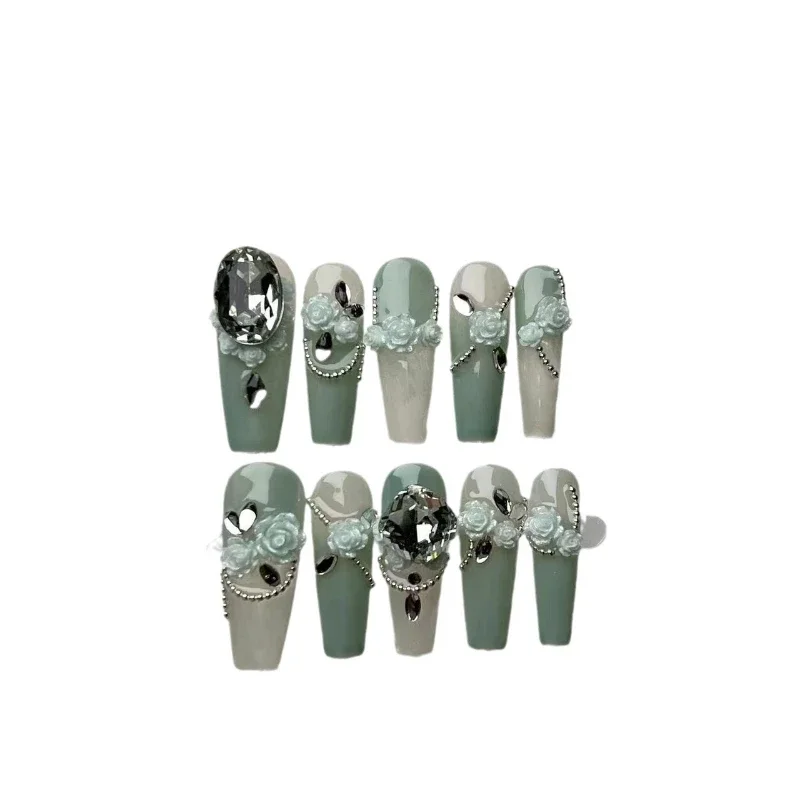 *Hand-worn manicure ice-clear green full diamond camellia chain with drill small diamond steel ball white fake nails
*Hand-worn manicure ice-clear green full diamond camellia chain with drill small diamond steel ball white fake nails