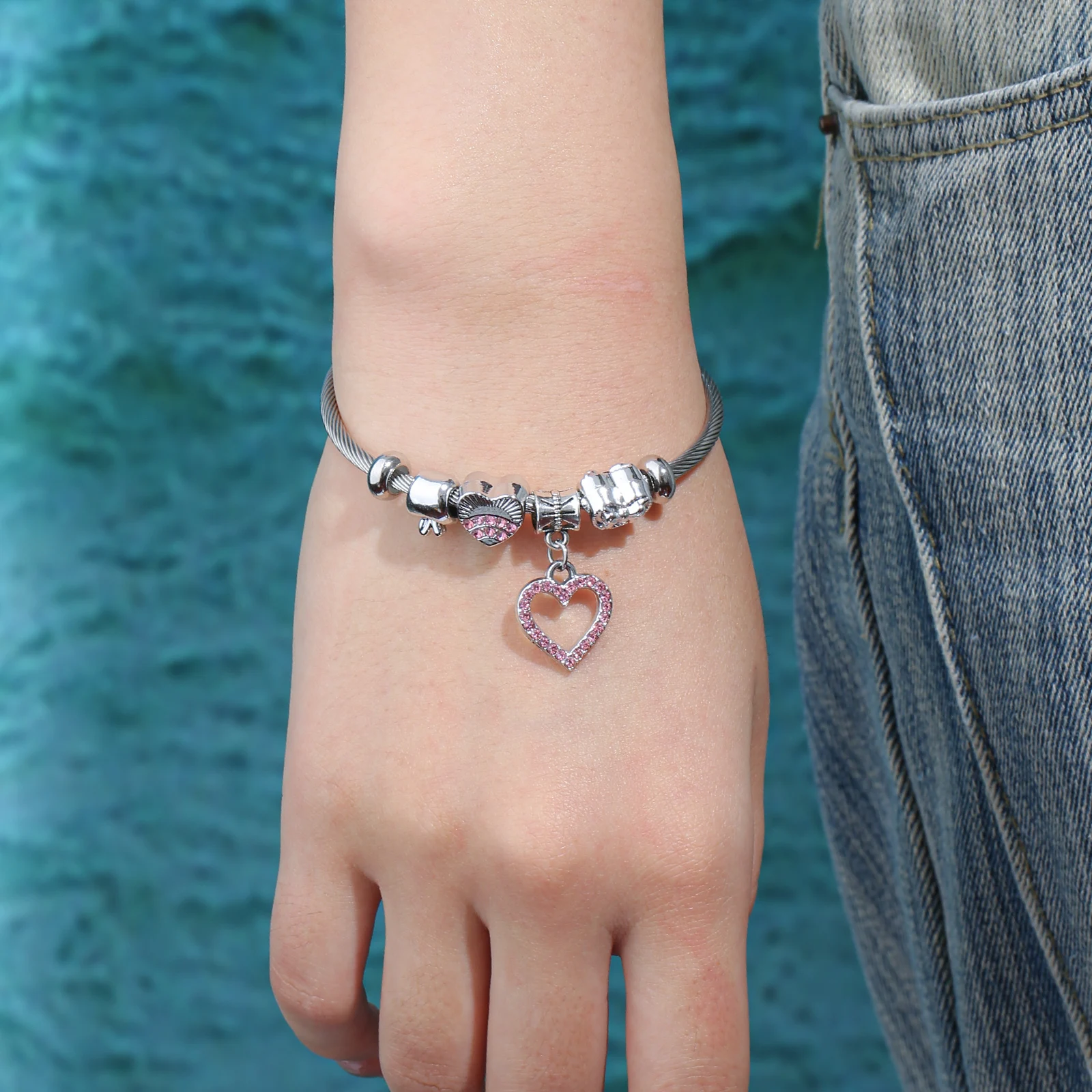 Silver Tone Charm Bangle with Pink Heart Pendant for Women
Silver Tone Charm Bangle with Pink Heart Pendant for Women