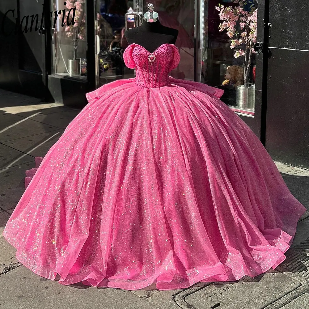 Pink Glitter Crystal Pearls Beading Ball Gown Quinceanera Dresses Off The Shoulder Bow Sweet 16 Vestidos De 15 Anos
Pink Glitter Crystal Pearls Beading Ball Gown Quinceanera Dresses Off The Shoulder Bow Sweet 16 Vestidos De 15 Anos
