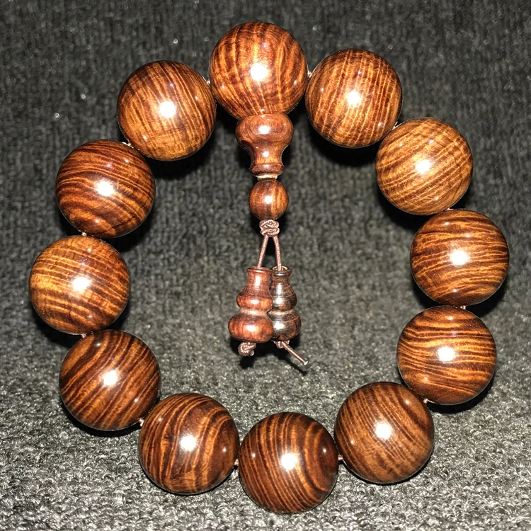 Vietnamese Red Sandalwood Face Eye Bracelet Huanghuali Beads Water Wave Pattern Mens Holiday Gift
Vietnamese Red Sandalwood Face Eye Bracelet Huanghuali Beads Water Wave Pattern Mens Holiday Gift