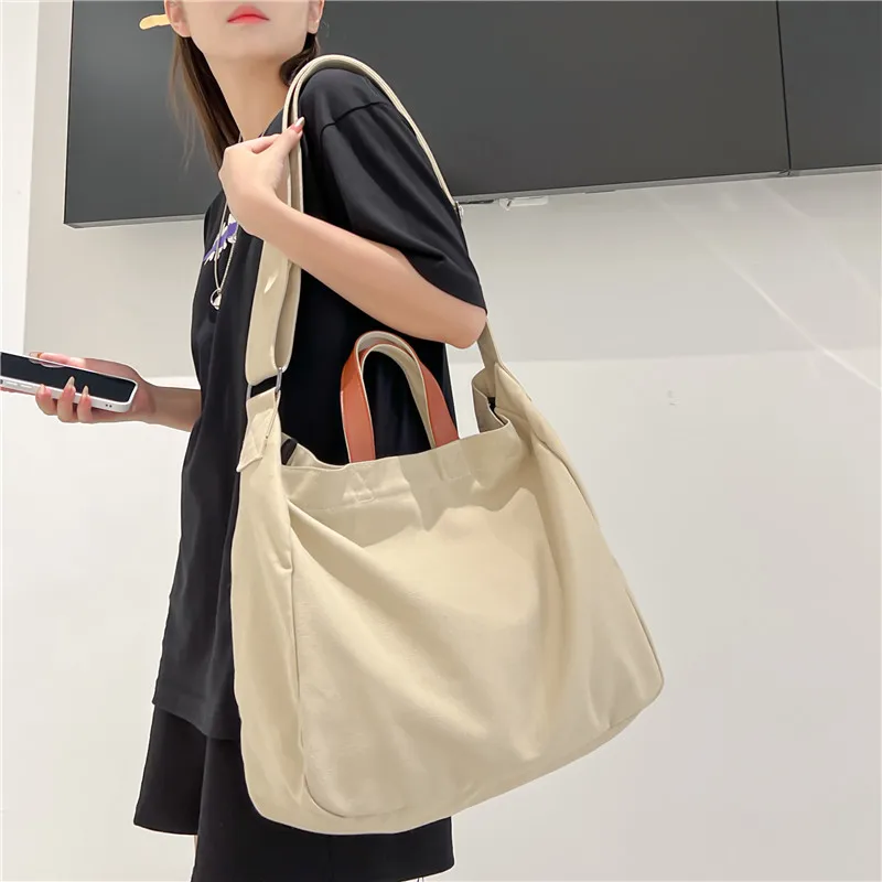 2023 New Satchel Canvas Fashion Women Men Shoulder Strap Sports Multi-function Big Capacity Bags With Large Pockets For Shopping
2023 New Satchel Canvas Fashion Women Men Shoulder Strap Sports Multi-function Big Capacity Bags With Large Pockets For Shopping