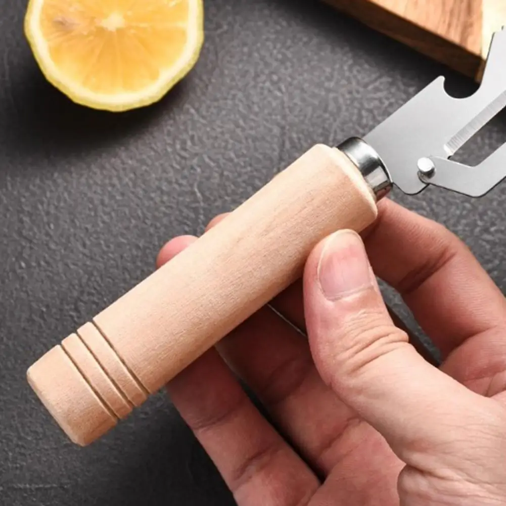 Vegetable Fruit Peeler with Non-slip Wood Handle 2-in-1 Bottle Opener Wide Curved Blade for Potatoes Carrots Kitchen Gadgets
Vegetable Fruit Peeler with Non-slip Wood Handle 2-in-1 Bottle Opener Wide Curved Blade for Potatoes Carrots Kitchen Gadgets