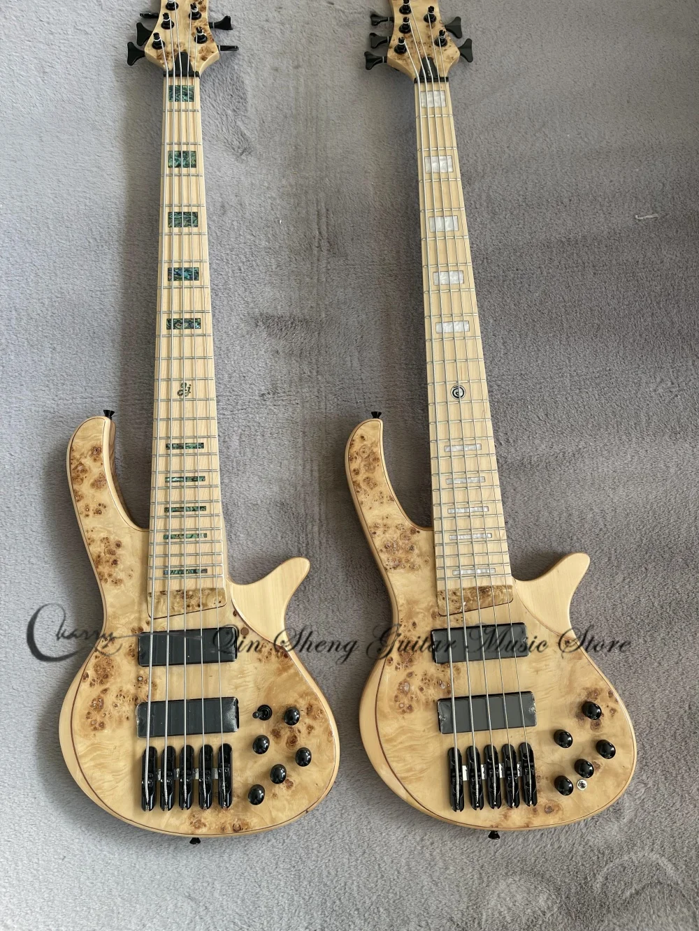6 string natural bass, Ash body, Burl maple top, black bridge, active battery, maple fretboard, 18-19mm
6 string natural bass, Ash body, Burl maple top, black bridge, active battery, maple fretboard, 18-19mm
