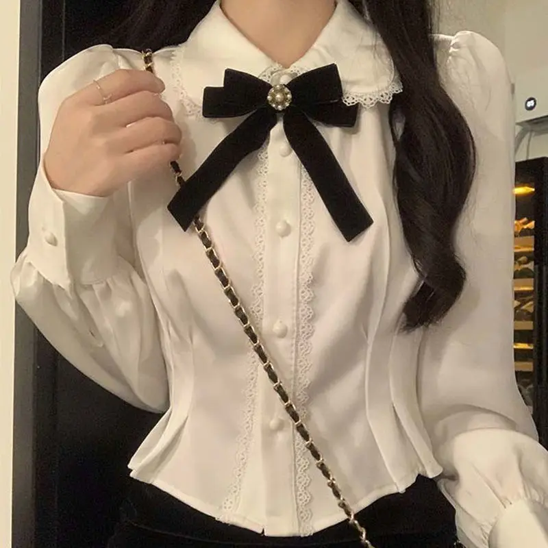 NIGGEEY Preppy Style Sweet Doll Collar Shirt Long-sleeved Blouse Female 2023 Autumn New Waist Short Design Blouse Women
NIGGEEY Preppy Style Sweet Doll Collar Shirt Long-sleeved Blouse Female 2023 Autumn New Waist Short Design Blouse Women