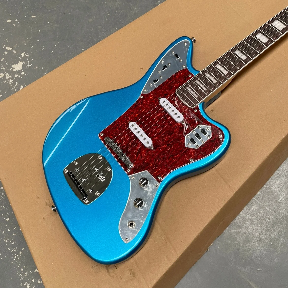6-string electricguitar with metallic blue asymmetric body and silver hardware guitars,advanced professional performanceguitarra
6-string electricguitar with metallic blue asymmetric body and silver hardware guitars,advanced professional performanceguitarra
