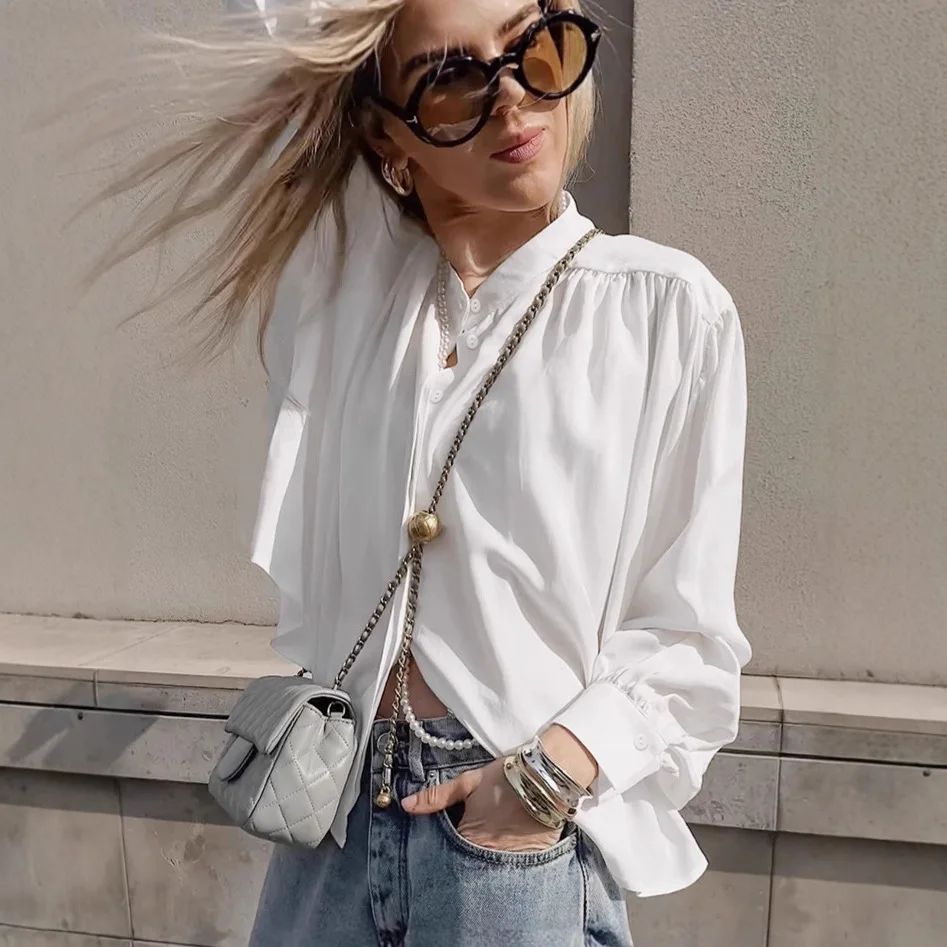 Белая осенняя женская рубашка с воротником-стойкой, однобортная женская блузка с длинным рукавом, темпераментная повседневная рубашка для женщин 
Белая осенняя женская рубашка с воротником-стойкой, однобортная женская блузка с длинным рукавом, темпераментная повседневная рубашка для женщин