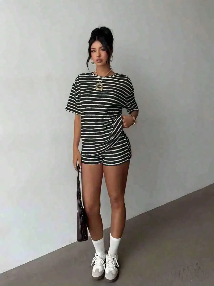 Women Black And White Striped Round Neck Short Sleeve Top And Elastic Waist Loose Shorts 2 Piece Set
Women Black And White Striped Round Neck Short Sleeve Top And Elastic Waist Loose Shorts 2 Piece Set