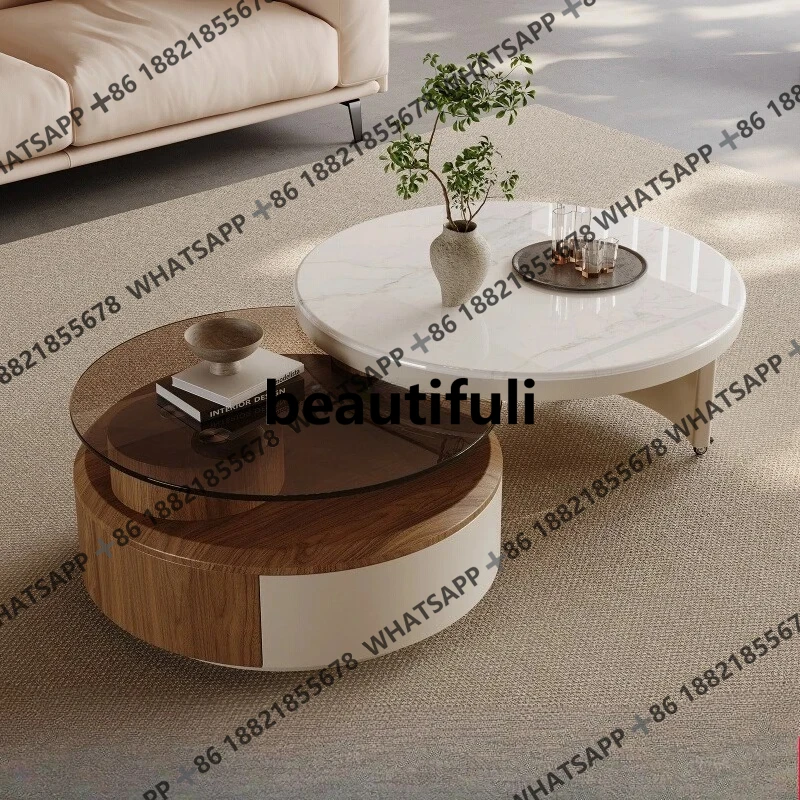 Ancient style rotating coffee table in the living room Light luxury high-end glass Round cream style household small
Ancient style rotating coffee table in the living room Light luxury high-end glass Round cream style household small